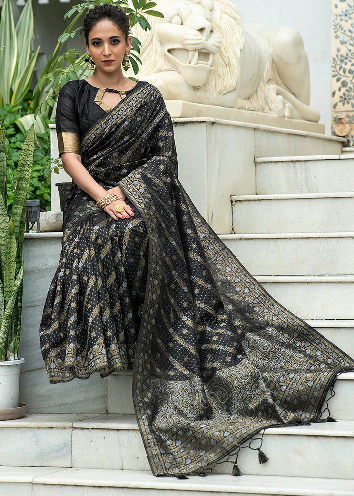 Soot Black Zari Woven Tussar Silk Saree with Tassels on Pallu | Stitched Blouse - qivii