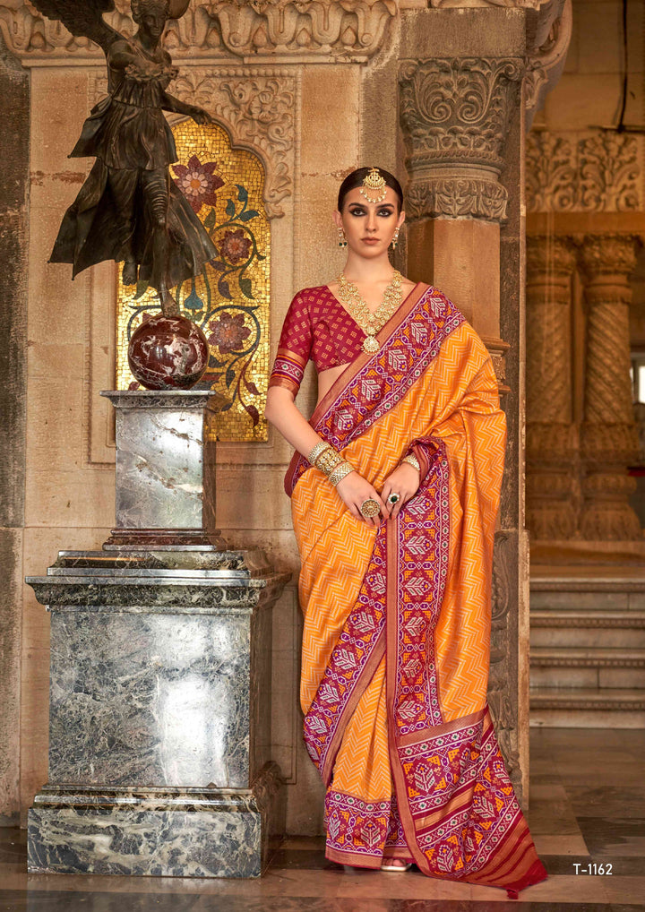 ORANGE COLOR PRINTED ART SILK FABRIC PATOLA SAREE