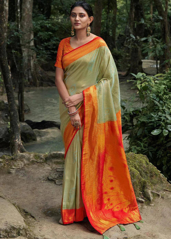 Tea Green Zari Woven Kanjivaram Silk Saree | Stitched Blouse - qivii