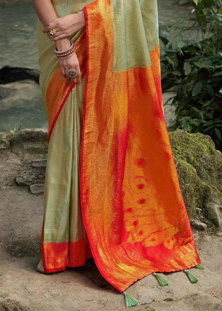 Tea Green Zari Woven Kanjivaram Silk Saree | Stitched Blouse - qivii