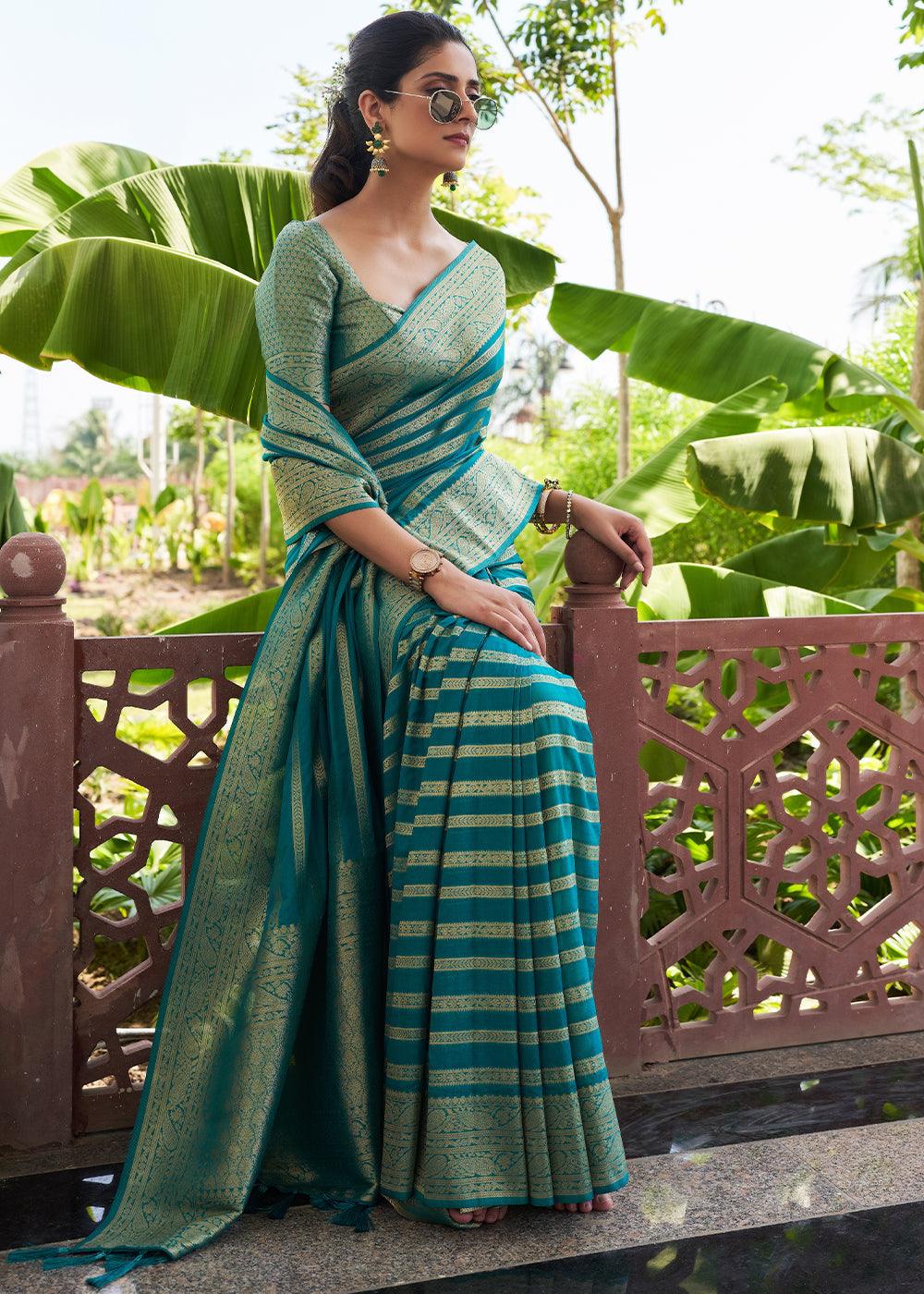 Teal Blue Zari Woven Leheriya Georgette Saree - qivii