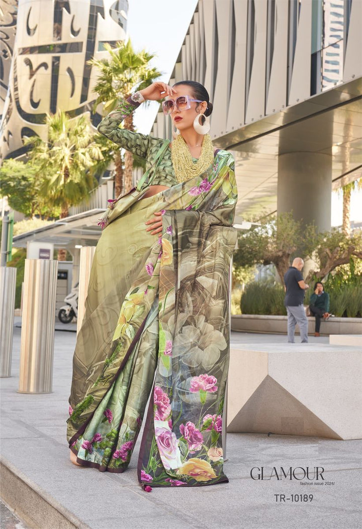 Beautiful green digital printed satin silk saree with intricate floral designs and gold border, perfect for traditional Indian occasions and events