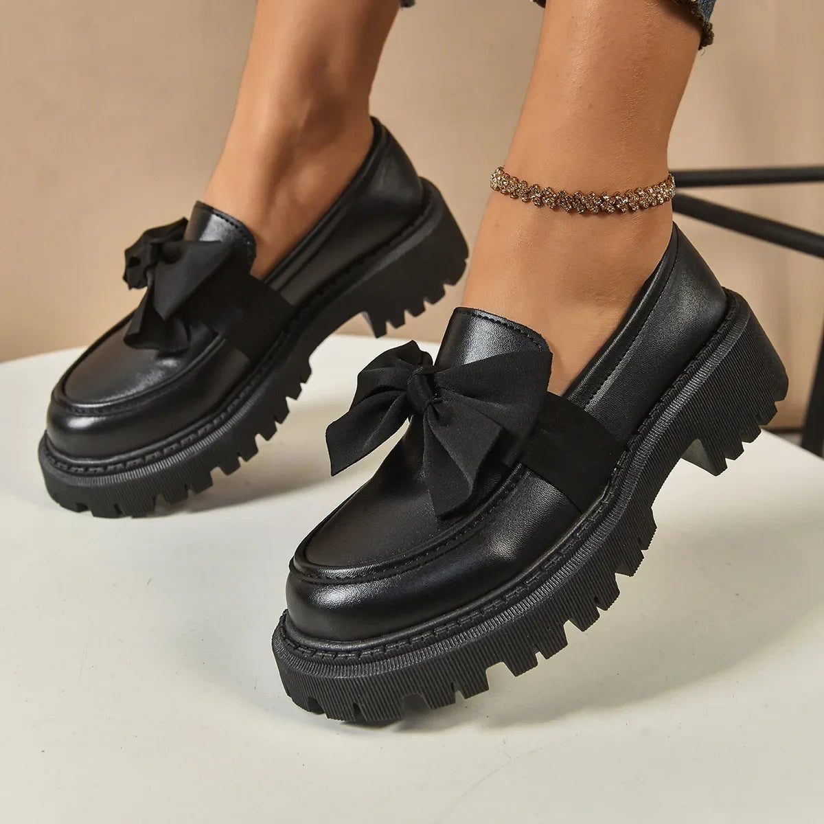 Hudson Ridge Traci women's orthopedic bow-tie loafers in matte black with cushioned soles and stylish design.