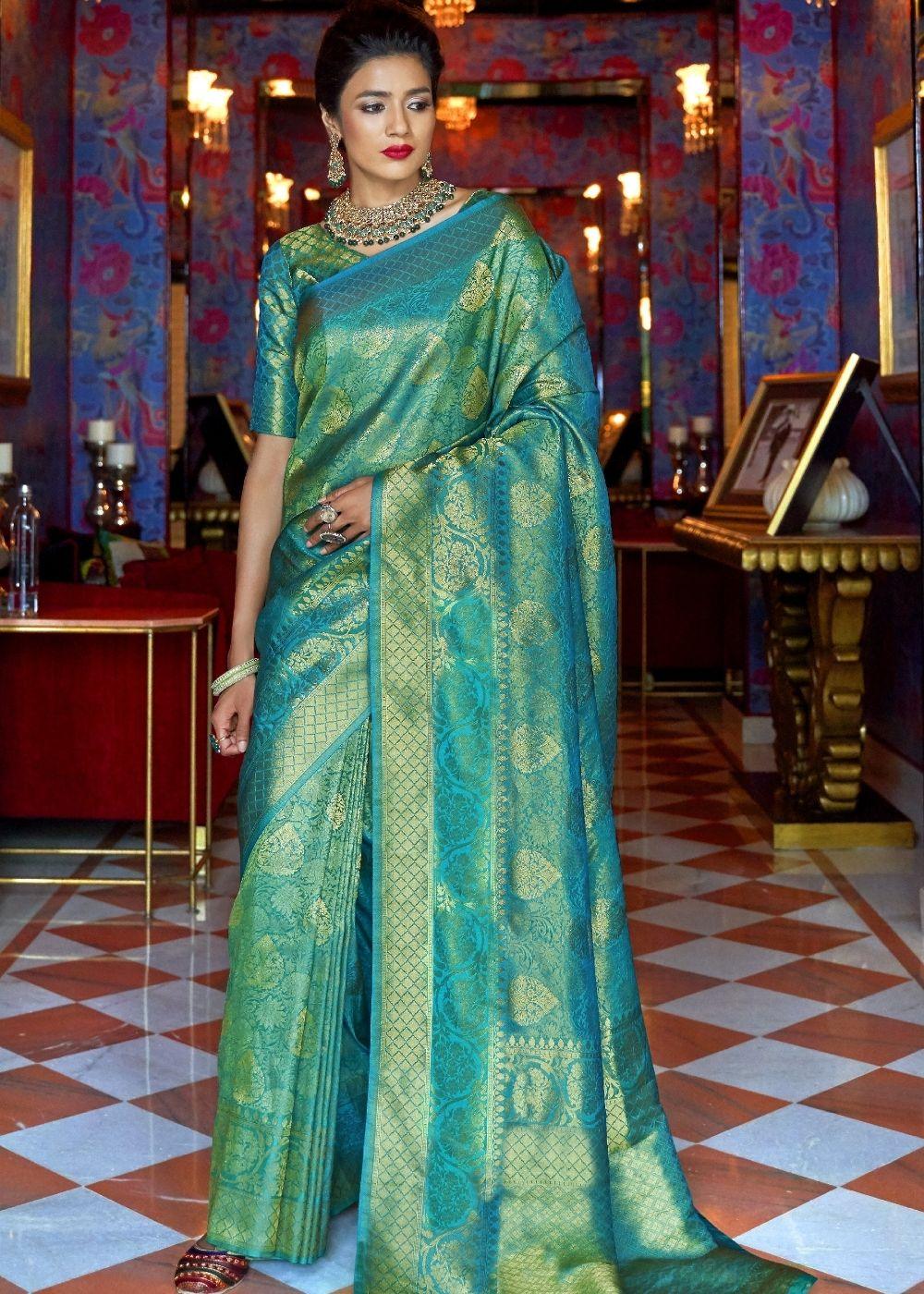 Turquoise Blue and Golden Blend Woven Kanjivaram Soft Silk Saree | Stitched Blouse - qivii