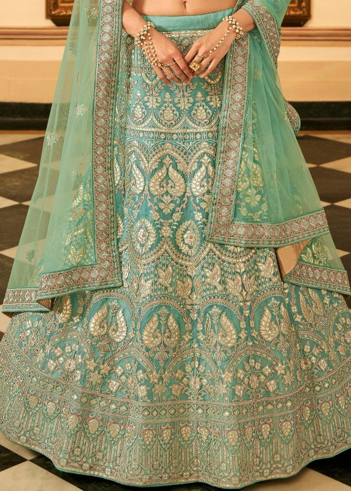 Turquoise Blue Organza Lehenga Choli with Zari, Dori, Resham, Gota & Zarkan work - qivii