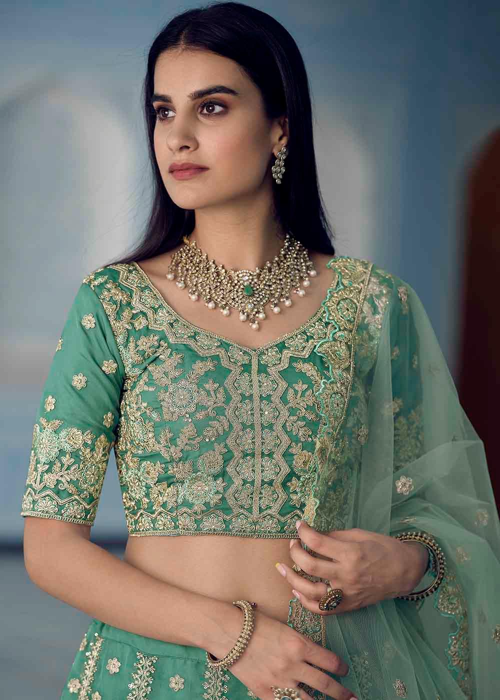 Turquoise Green Organza Lehenga Choli with Dori,Zari, Zarkan & Sequins work - qivii