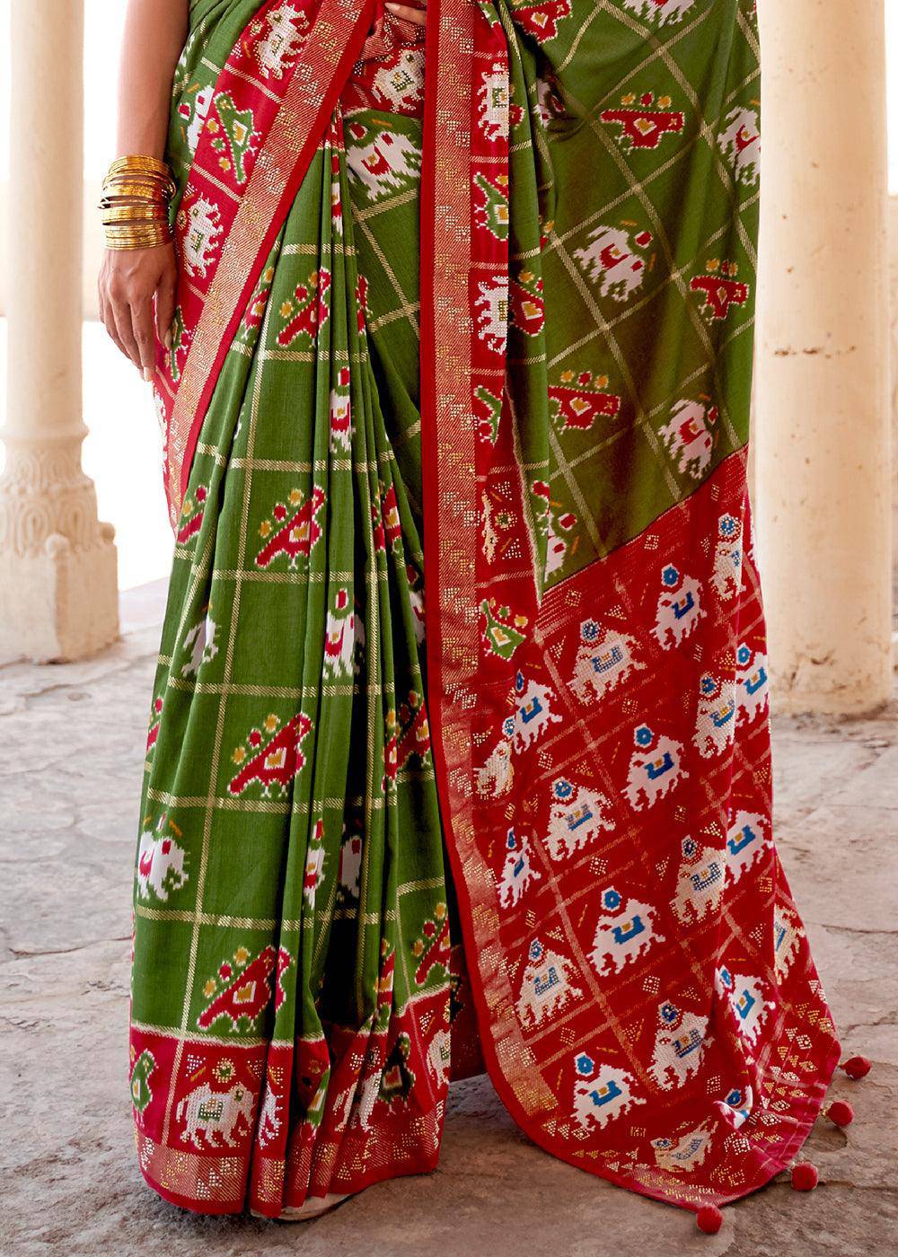 Verdun Green Printed Patola Silk Saree with Zari Border & Tassels on Pallu | Stitched Blouse - qivii