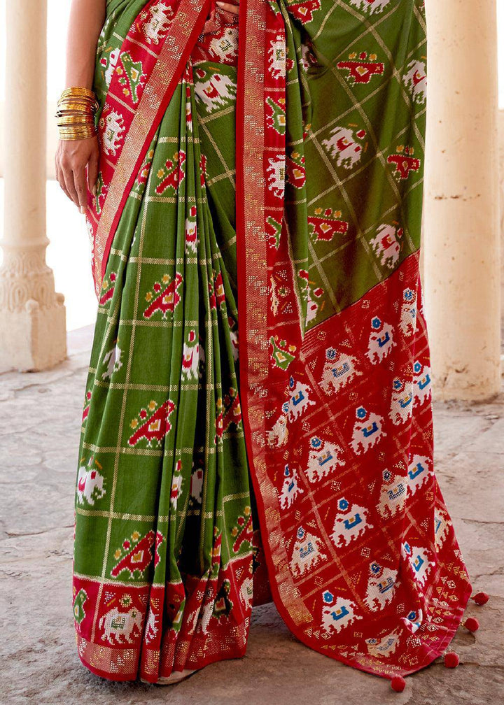 Verdun Green Printed Patola Silk Saree with Zari Border & Tassels on Pallu | Stitched Blouse - qivii