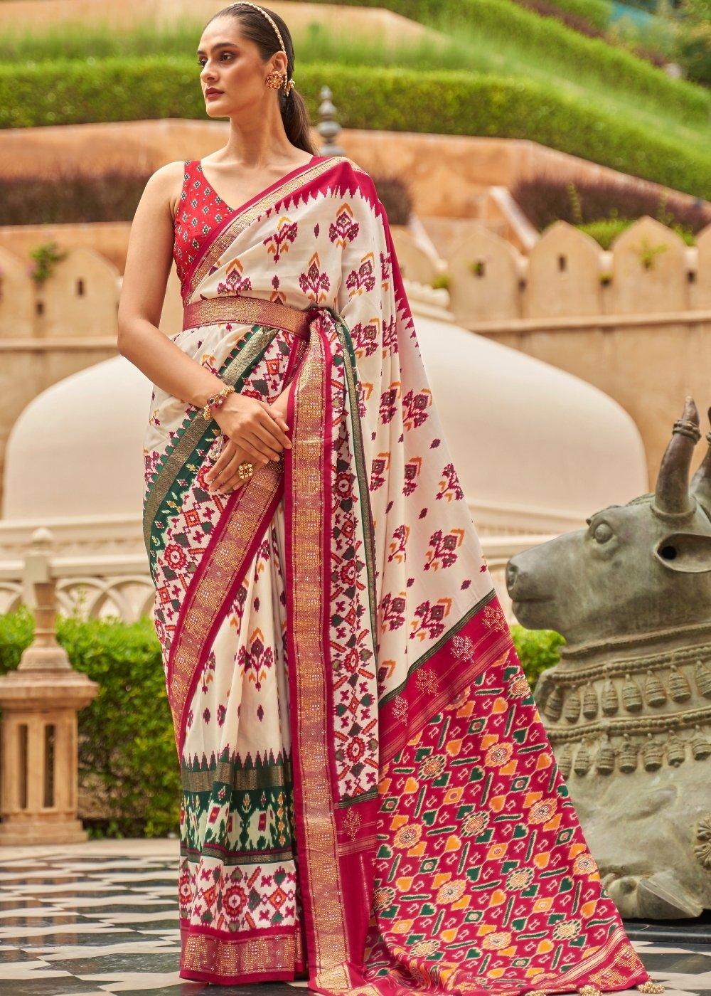 White & Red Patola Silk Saree with Zari Border & Tassels On Pallu | Stitched Blouse - qivii