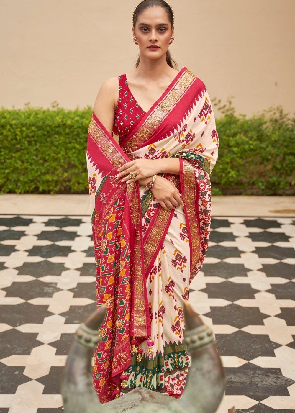 White & Red Patola Silk Saree with Zari Border & Tassels On Pallu | Stitched Blouse - qivii