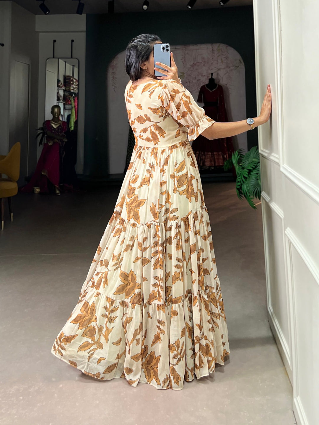 White and Brown Georgette Printed Micro Cotton Gown with intricate floral patterns and a flowing silhouette for a stylish and comfortable look