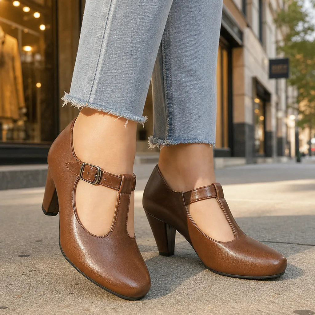 Brown women's Mary Jane heels by Hudson Ridge, classic style with rounded toe and low block heel, perfect for elegant footwear.