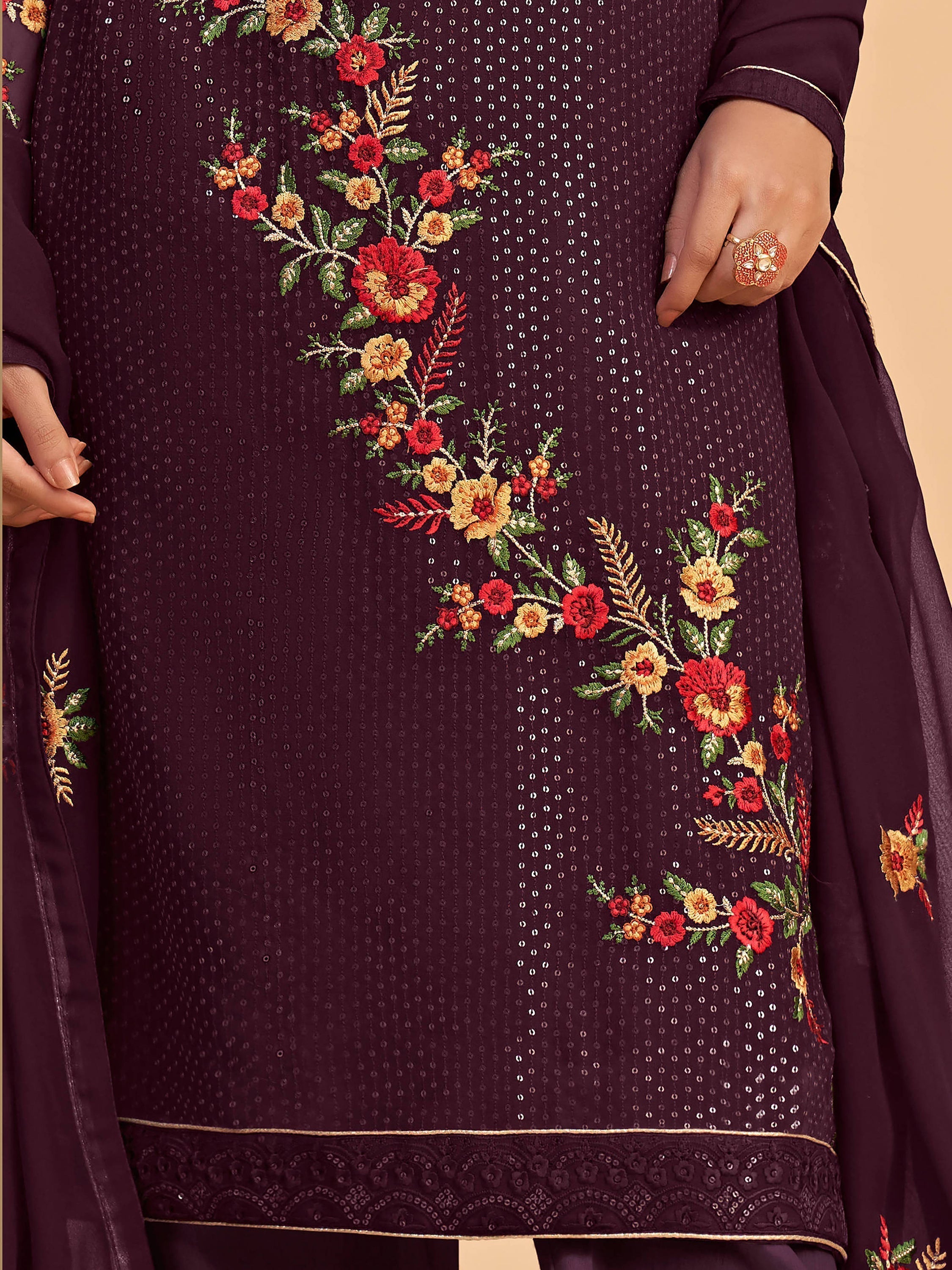 Similar color salwar created with dull santoon material and similar color georgette material dupatta made with butta work