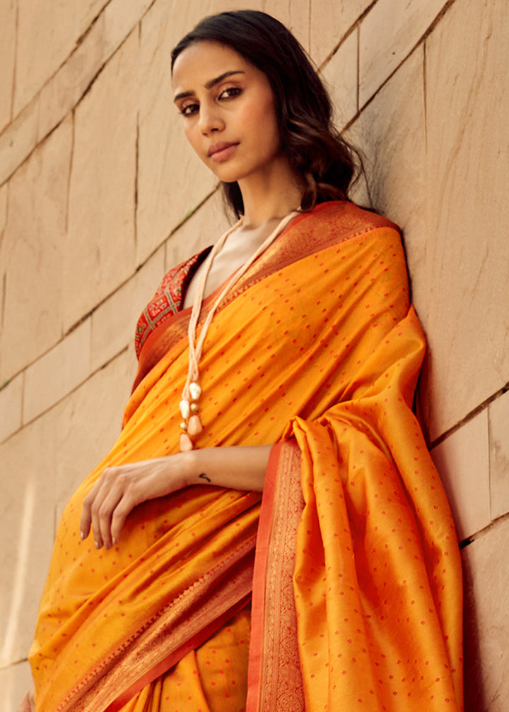 Saffron Yellow Woven Patola Silk Saree